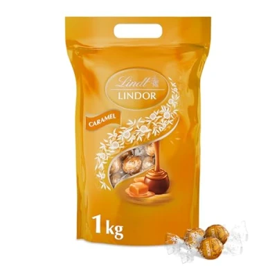 Abbildung von Lindt Schokolade LINDOR Schokoladen Kugeln Caramel 1 kg Beutel Wiederverschließbar ca. 80 Milch mit Karamellcrèmefüllung Pralinen Geschenk