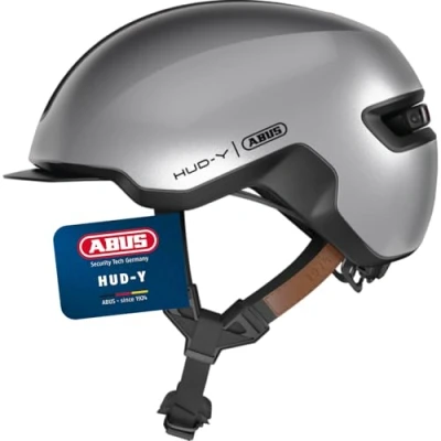 Abbildung von ABUS Urban Helm HUD Y mit magnetischem, aufladbarem LED Rücklicht &amp; Magnetverschluss cooler Fahrradhelm für den Alltag Damen und Herren Silber, Größe L