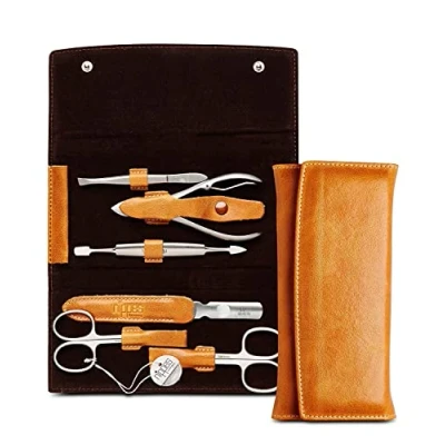 Abbildung von nippes Solingen, Premium Line Maniküre Set, Cognac, Braun, 6 teilig, Edelstahl rost und nickelfrei, Rindsleder Etui mit Druckknopf, Nagelschere, Nagelpflege