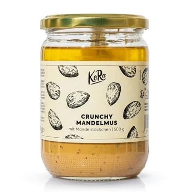 Abbildung von KoRo Crunchy Mandelmus 500 g Cremiges Mus mit gerösteten Mandelstückchen Pflanzliche Proteinquelle Perfekt als knuspriges Topping oder Aufstrich Ohne Zusätze