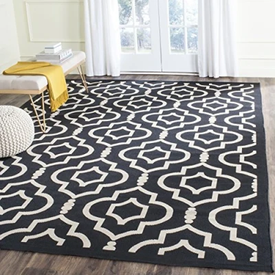 Abbildung von SAFAVIEH Geometrisch Teppich für Wohnzimmer, Esszimmer, Schlafzimmer Wasserdicht Courtyard Collection, Kurzer Flor, Schwarz und Beige, 79 X 152 cm