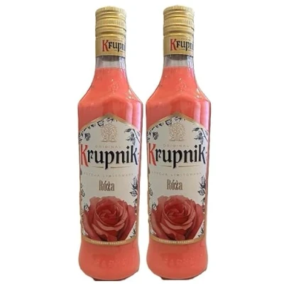 Abbildung von 2 Flaschen Krupnik Roza Rosenlikör a 500 ml 16% vol. + Space Riegel 45g von Onlineshop Bormann