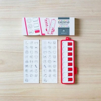 Abbildung von Checkpad rood: dagplanner voor taakjes in ochtend en avond