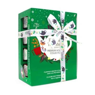 Abbildung von ETS Teegeschenk mit Schleife &quot;Holiday Collection&quot; grün 12 BIO Wintertees 4 verschiedene Sorten Pyramidenbeutel Umweltfreundliches Geschenk zu Weihnachten