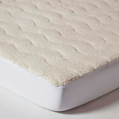 Abbildung von Homescapes Warmer Fleece Matratzentopper 120x190 cm, Kuschelige Matratzenauflage Plüsch mit Spannumrandung