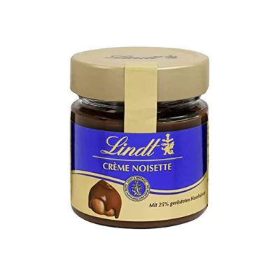 Abbildung von Lindt Schokolade Brotaufstrich Crème Noisette 220 g Haselnusscrème im Glas mit aromatischem Kakao und 25% gerösteten Haselnüssen Schokoladen Schokoladengeschenk