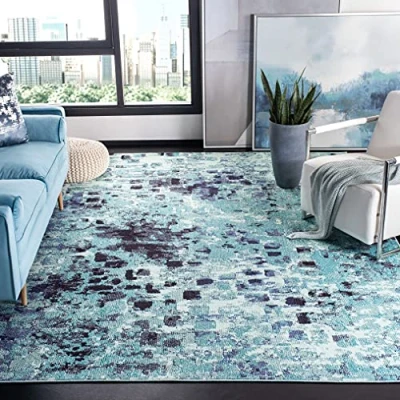 Abbildung von SAFAVIEH Moderner Schick Teppich für Wohnzimmer, Esszimmer, Schlafzimmer Madison Collection, Kurzer Flor, Türkis und Marine, 91 X 152 cm