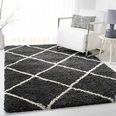 Abbildung von SAFAVIEH Zottelig Teppich für Wohnzimmer, Esszimmer, Schlafzimmer Hudson Shag Collection, Hoher Flor, Dunkelgrau und Elfenbein, 155 X 229 cm