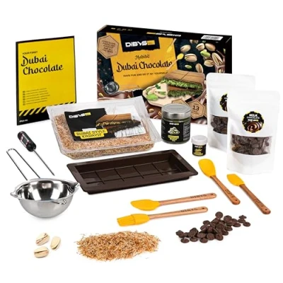 Abbildung von DiBYS Dubai Schokolade Set Schokoladenform Silikon und Zutaten 200g Pistaziencreme 300g Vollmilchschokolade Engelshaar Teigfäden Kadayif Form mit Essbarem Goldglitzer