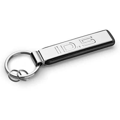 Abbildung von Volkswagen 000087010CEYPN Schlüsselanhänger mit ID.5 Schriftzug, Keychain, Schlüsselring, Silber/Schwarz, Metall Länge: 10cm / Breite: 4,5cm Höhe: 0,3cm