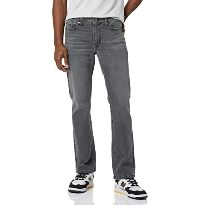 Abbildung von Amazon Essentials Herren Bootcut Jeans mit schmaler Passform, Verwaschenes Grau, 32W / 34L
