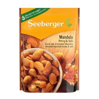 Abbildung von Seeberger Mandeln Honig &amp; Salz 13er Pack: Honigsüß trifft nussig salzig halbierte Mandelkerne als handlicher Begleiter für unterwegs geröstet gesalzen, vegetarisch (13 x 80 g)