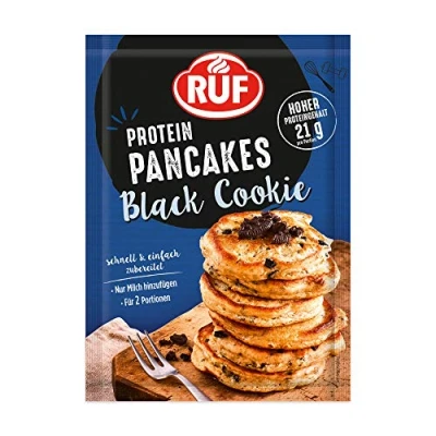 Abbildung von RUF Protein Pancakes Black Cookie mit knusprigen Keksbröseln, schnell zubereitet, fluffiges Genießer Frühstück, hoher Proteingehalt, 1 x 150g Beutel