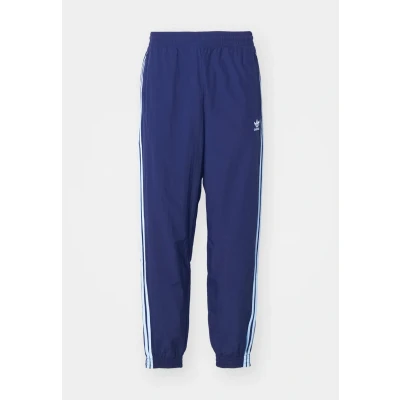 Abbildung von adidas Originals Firebird Pants Jogginghose, Herren, Größe: XS, Night indigo