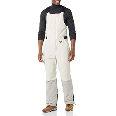 Abbildung von Amazon Essentials Herren Wasserfeste, isolierte Schnee Latzhose, Elfenbein Grau Farbblock, S