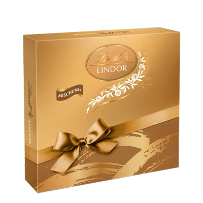 Abbildung von Lindt Schokolade LINDOR Präsent Box Mischung 187 g Ca. 15 Kugeln in den Sorten Vollmilch, Dark 60%, Haselnuss und Weiß festlichem Design Pralinengeschenk Schokoladengeschenk
