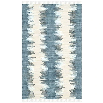 Abbildung von SAFAVIEH Modern Teppich für Wohnzimmer, Esszimmer, Schlafzimmer Montauk Collection, Kurzer Flor, Blau, 91 X 152 cm