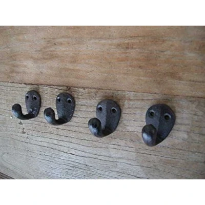 Abbildung von Deko Impression Wandhaken 4 er Set kleine Wandhaken, Wandgarderobe, Gusseisen, braunrostfarben, (4 St)