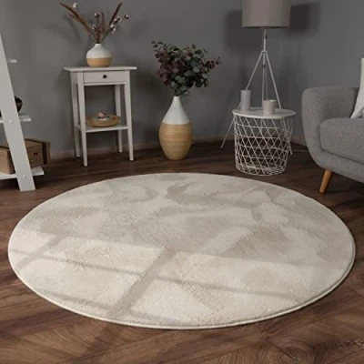 Abbildung von Paco Home Teppich Wohnzimmer Kunstfell weich waschbar modern elegant pflegeleicht Felloptik Uni Seidenglanz flauschig Kurzflor, Grösse:200 cm Rund, Farbe:Creme