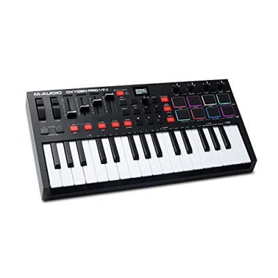 Abbildung von M Audio Oxygen Pro Mini 32 Tasten USB MIDI Keyboard Controller mit Beat Pads, zuweisbaren Reglern, &amp; Fadern, Softwarepaket inklusive