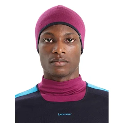 Abbildung von Icebreaker Merino Unisex Erwachsene Mütze mit Taschenmütze, Wintermütze, Wolle Beanie, Go Berry/Midnight Navy, One Size
