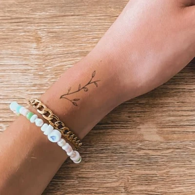 Abbildung von Inkster Tattoo Blätterzweig Temporäres mit EU Kosmetikzertifizierung wasserfest + vegan revolutionäres 2 Wochen Fake Tattoos und Klebetattoos für Erwachsen