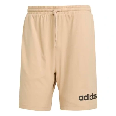 Abbildung von adidas Herren Essentials LINEAR Single Jersey Short, warm Sandstone/Black, XS