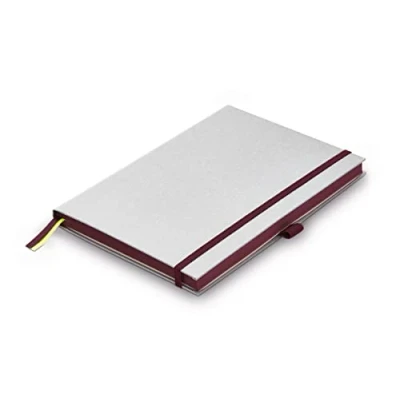 Abbildung von Lamy paper Hardcover A6 Notizbuch 810 Format DIN (102 x 144 mm) in dunkelviolett mit Lineatur, 192 Seiten und elastischem Verschlussband