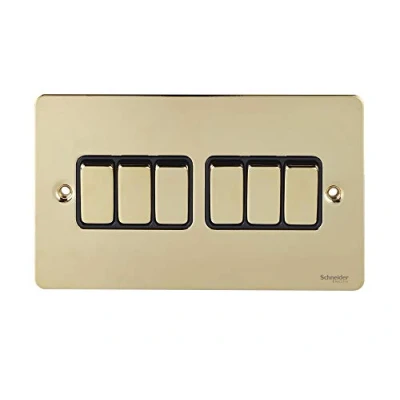 Abbildung von Schneider Electric Ultimate Flat Plate 6 facher 2 Wege Wipp Lichtschalter, einpolig, 16AX, GU1262BPB, poliertes Messing mit schwarzem Einsatz