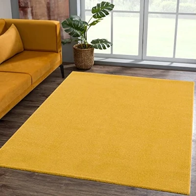 Abbildung von SANAT Kurzflor Teppich Wohnzimmer Uni Modern Teppiche fürs Schlafzimmer, Arbeitszimmer, Büro, Flur, Kinderzimmer und Küche Gelb, 60 x 110 cm