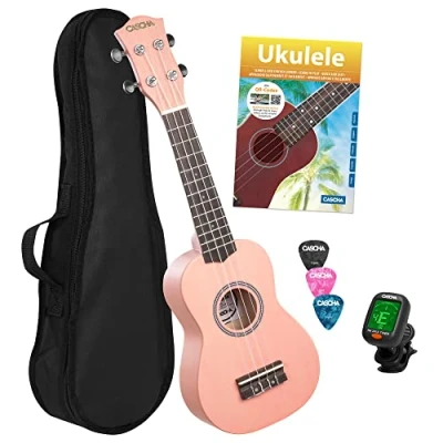 Abbildung von CASCHA Sopran Ukulele Set für Kinder und Erwachsene I Starter Kit mit 3 Plektren Tasche Lehrbuch Lernvideos über QR Code Stimmgerät Aquila Saiten Nylon Kleine Hawaii Gitarre Pink