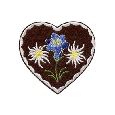Abbildung von Monoquick Bügelbild Aufnäher Patch Applikation zum Aufbügeln Trachten Herz Edelweiß Enzian 6,0 x cm