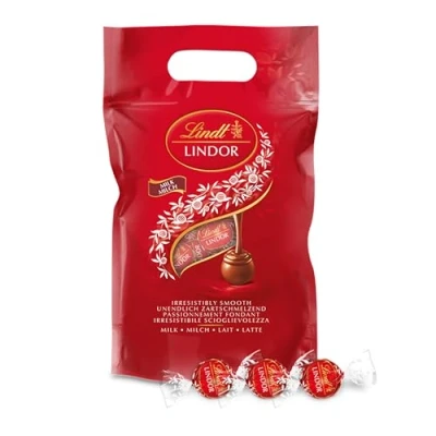 Abbildung von Lindt LINDOR Schokoladen Kugeln Vollmilch ca. 80 Milch Schokolade mit zartschmelzender Füllung Großpackung, Pralinen Geschenk, 1kg