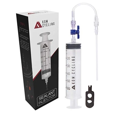 Abbildung von KOM Fahrrad Ventilwerkzeug Spritze und Presta Valve Core Removal Tool von Stans No Tubes für Dichtmittel andere Dichtungsmittel
