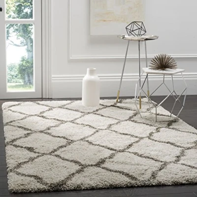 Abbildung von SAFAVIEH Zottelig Teppich für Wohnzimmer, Esszimmer, Schlafzimmer Hudson Shag Collection, Hoher Flor, Elfenbein und Grau, 155 X 229 cm