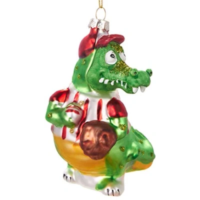 Abbildung von BRUBAKER Christbaumschmuck Mundgeblasene Weihnachtskugel Krokodil mit Ball, lustige Weihnachtsdekoration aus Glas, handbemalt ca. 11.5 cm
