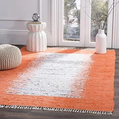Abbildung von SAFAVIEH Modern Teppich für Wohnzimmer, Esszimmer, Schlafzimmer Montauk Collection, Kurzer Flor, Elfenbein und Orange, 152 X 244 cm