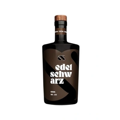 Abbildung von edelschwarz Cocoa Bio Gin, 500 ml, 42% vol. premium handcrafted Gin Edelkakao der Ur Bohne Chuncho im Einklang mit alpinen Botanicals Qualität Made in Südtirol
