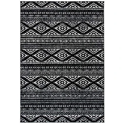 Abbildung von SAFAVIEH Boho Teppich für Wohnzimmer, Esszimmer, Schlafzimmer Tulum Collection, Kurzer Flor, Schwarz und Elfenbein, 91 X 152 cm