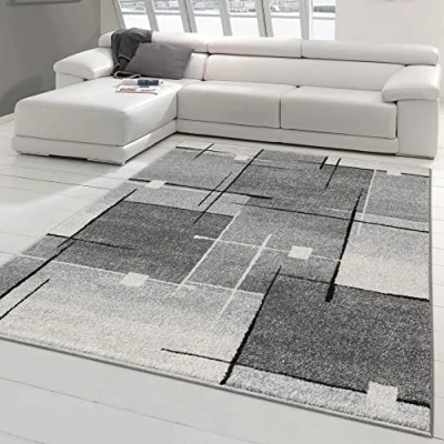 Abbildung von Teppich Traum Designerteppich Schlafzimmer mit modern dezent abstrakten Quadraten pflegeleicht schwarz grau, Größe 160x220 cm