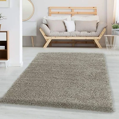 Abbildung von Carpetsale24 Shaggy Hochflor Teppich Wohnzimmer 140 x 200 cm Natur Modern Flauschiger Extra Weich, Pflegeleicht und Einfarbig Ideal als für Schlafzimmer, Esszimmer Küche