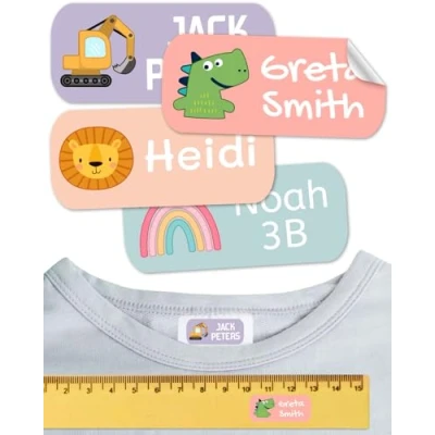 Abbildung von Namensaufkleber für Kinder. Kleidung und Gegenstände. Namensschilder waschmaschinenfest personalisiert text symbolen (Aura, 100 Stück)