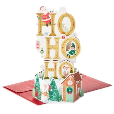 Abbildung von Hallmark Weihnachtskarte, Winterwunderland Design, 3D und Pop Up Karte, Weihnachtsmann, Elfen, Grün, Rot, Gold