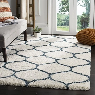 Abbildung von SAFAVIEH Zottelig Teppich für Wohnzimmer, Esszimmer, Schlafzimmer Hudson Shag Collection, Hoher Flor, Elfenbein und Schieferblau, 155 X 229 cm