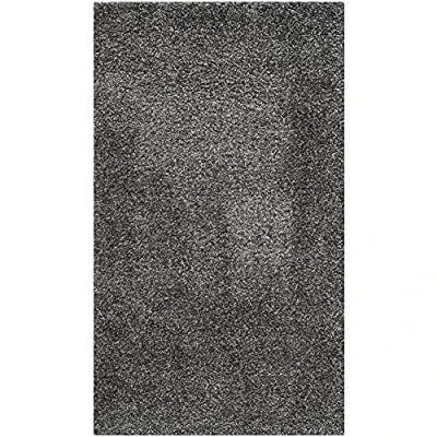 Abbildung von SAFAVIEH Zottelig Teppich für Wohnzimmer, Esszimmer, Schlafzimmer California Shag Collection, Hoher Flor, Dunkelgrau, 69 X 152 cm