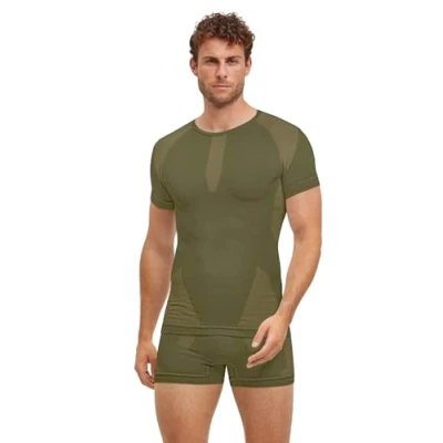 Abbildung von FALKE Herren Baselayer Shirt Warm Round Neck M S/S TS Funktionsmaterial schnelltrocknend 1 Stück, Grün (Herb 7754) neu umweltfreundlich, XXL