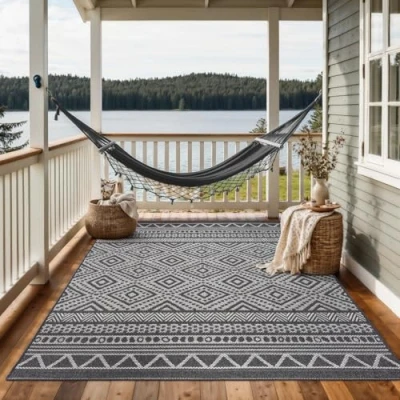 Abbildung von the carpet Calgary robuster Teppich, Flachgewebe, modernes Design, ideal für Wohnzimmer, Esszimmer und Außenbereich, In Outdoor, Vintage Optik, Boho Style, Anthrazit, 80 x 150 cm