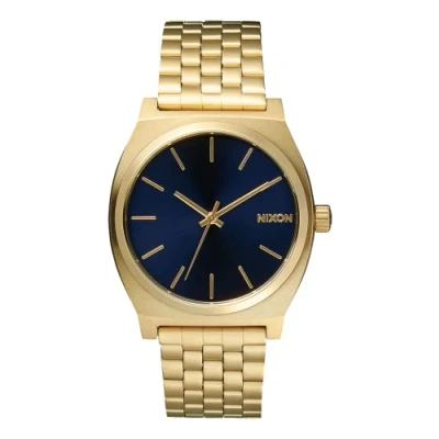 Abbildung von Nixon Time Teller Herrenuhr Analog Quarz mit Edelstahl Armband All Light Gold / Cobalt