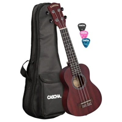 Abbildung von CASCHA Mahagoni Rot Sopran Linkshänder Ukulele Erwachsene &amp; Kinder inkl. 3 Plektren gepolsterte Tasche Mahagoniholz für Anfänger Fortgeschrittene Aquila Nylon Saiten