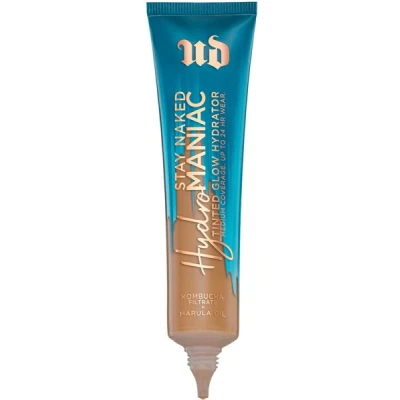 Abbildung von Urban Decay Hydromaniac getönte Feuchtigkeitscreme, 60 Medium Dark Warm 24H Longwear, schwerelose aufbaubare mittlere Abdeckung für gesunde, leuchtende Haut mit Kombucha Filtrat &amp; Marula Öl
